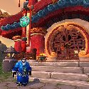 Mists of Pandaria -- Pandaren in front of a Pandaren building