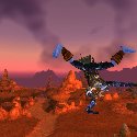 Troll making a handstand in the air